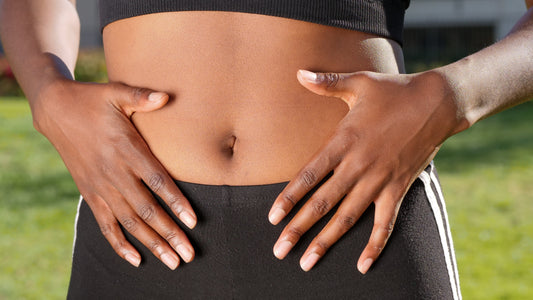 woman holding her stomach